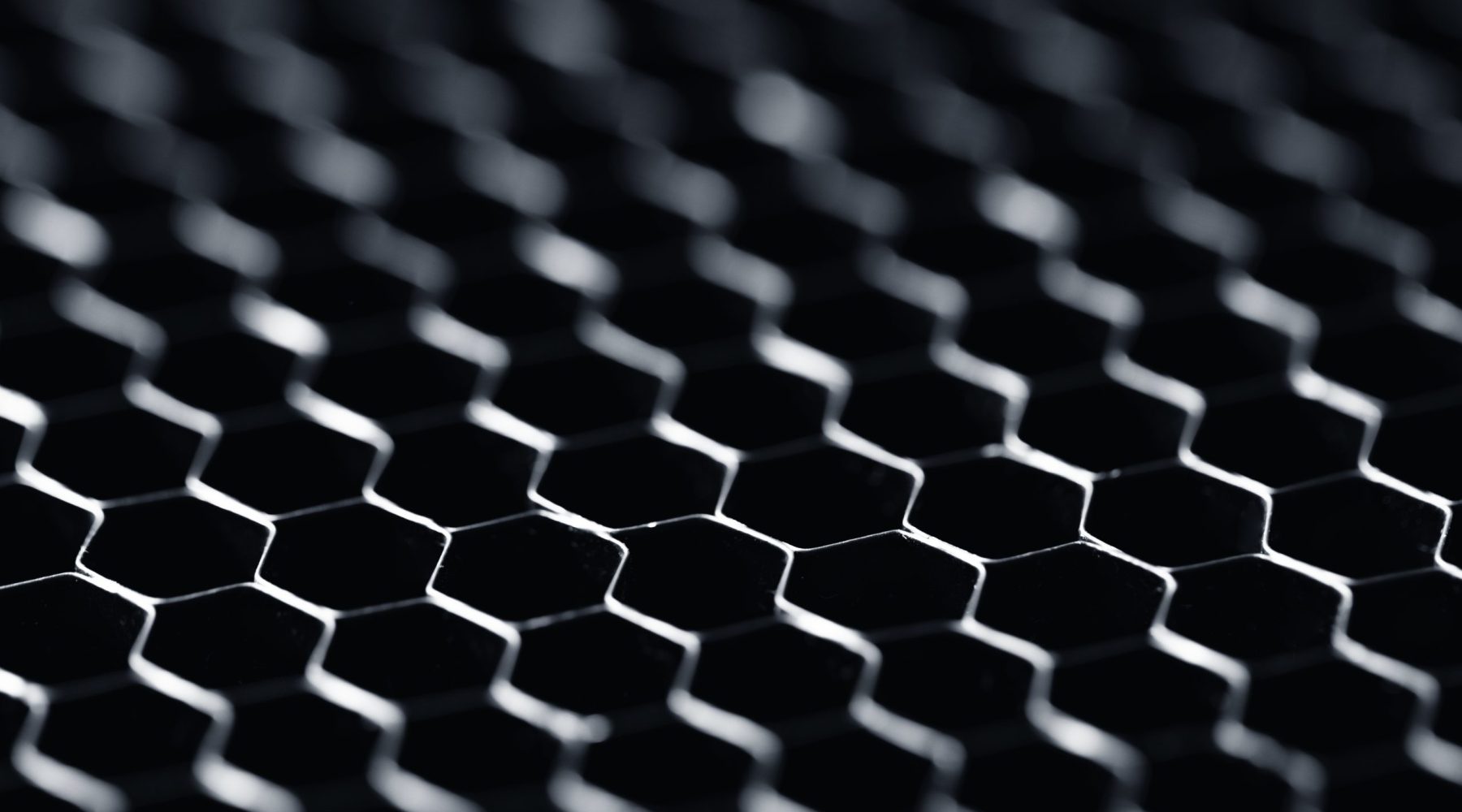 Closeup of abstract hi-tech surface with a honeycomb cells